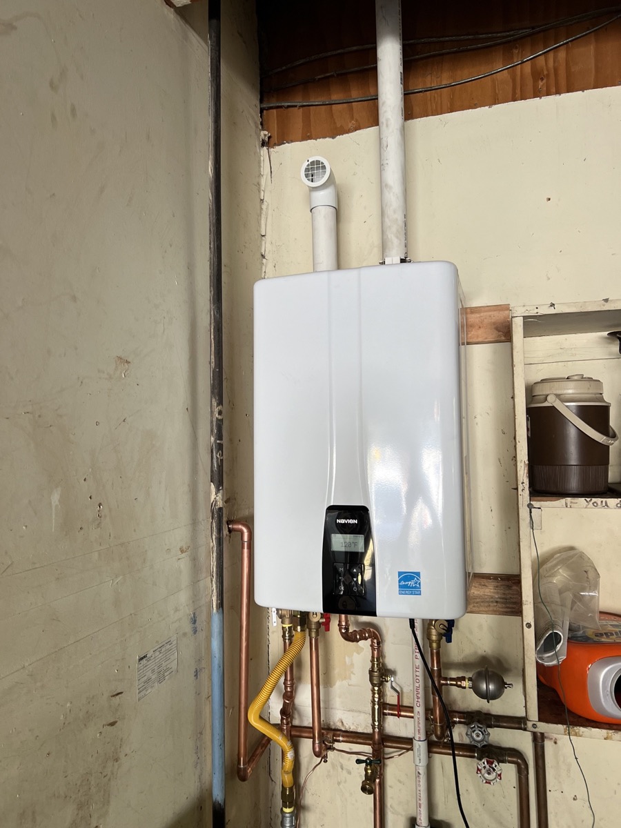 Indoor tankless installation completed by Golden Bay Plumbing